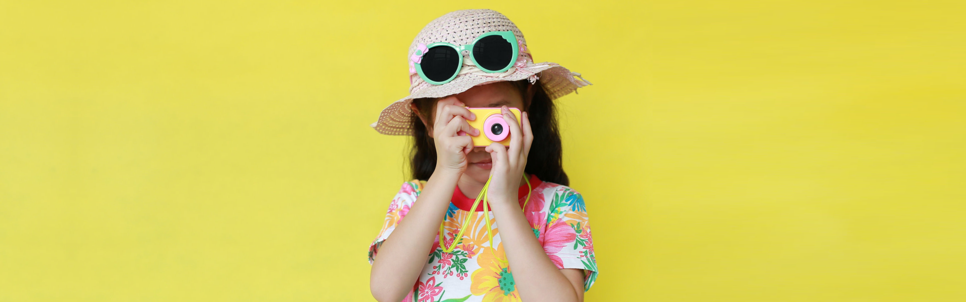 little girl taking a picture